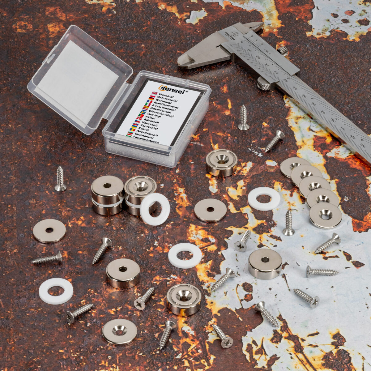 Magnes neodymowy pierścieniowy w obudowie stalowej z otworem pod wkręt 20×7 mm, z podkładkami